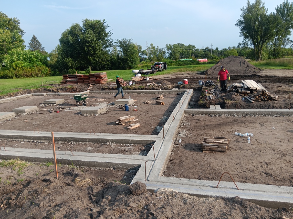 Concrete footings with rebar dowels, ready for walls