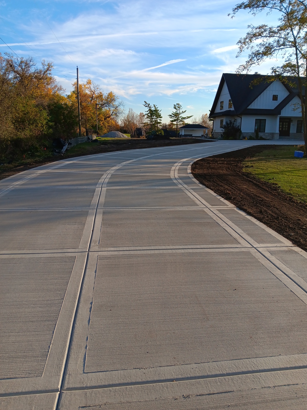 Curved concrete driveway, second view